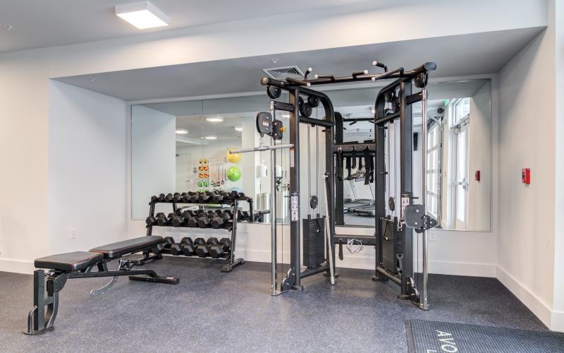 a room with a few treadmills and a treadmill